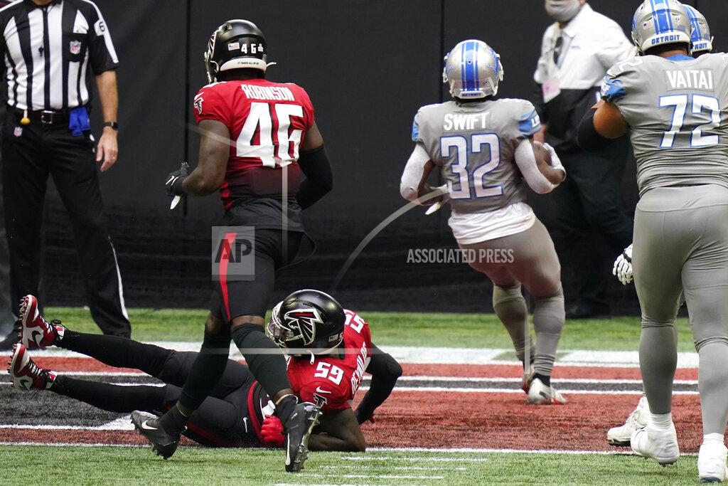 Brynn Anderson Detroit Lions running back D'Andre Swift (32) runs into the end zone for a touchdown against the Atlanta Falcons during the first half of an NFL football game, Sunday, Oct. 25, 2020, in Atlanta. (AP Photo/Brynn Anderson)