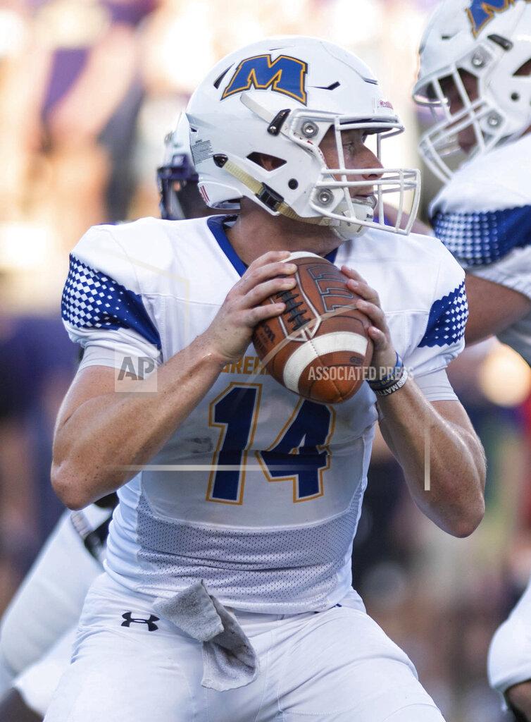 Daniel Lin Morehead State quarterback Mark Pappas looks for a receiver during the first half against James Madison in an NCAA college football game in Harrisonburg, Va., Saturday, Sept. 4, 2021. (Daniel Lin/Daily News-Record via AP)