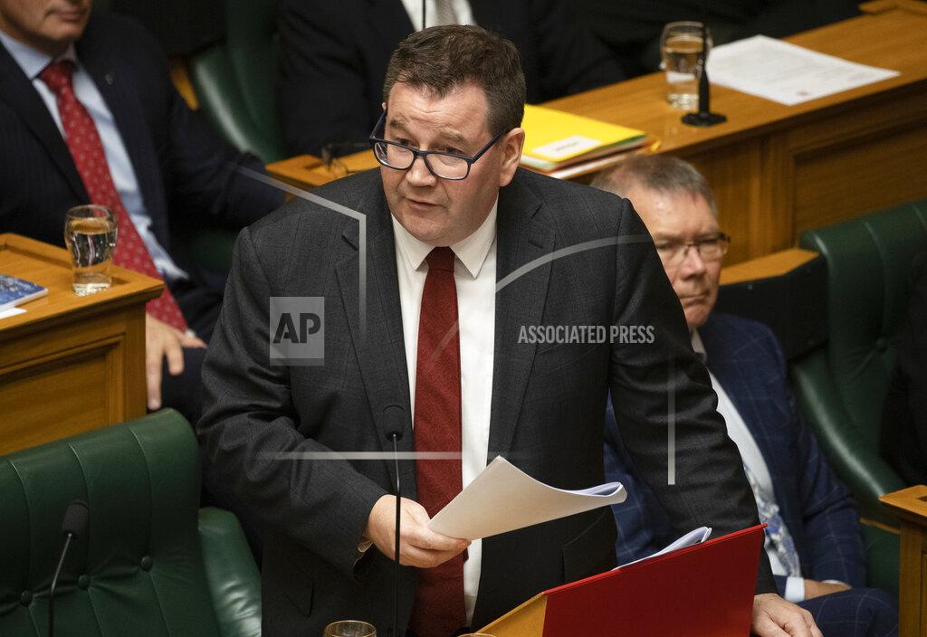 Mark Micthell New Zealand Finance Minister Grant Robertson delivers his budget to parliament in Wellington, New Zealand, Thursday, May 20, 2021. New Zealand plans to rebuild its Antarctic base and spend billions more on welfare payments as part of a spending program aimed at lifting the economy out of a coronavirus slump. (Mark Mitchell/NZ Herald via AP)