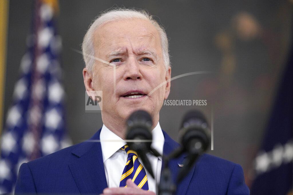 Evan Vucci President Joe Biden speaks about reaching 300 million COVID-19 vaccination shots, in the State Dining Room of the White House, Friday, June 18, 2021, in Washington. (AP Photo/Evan Vucci)