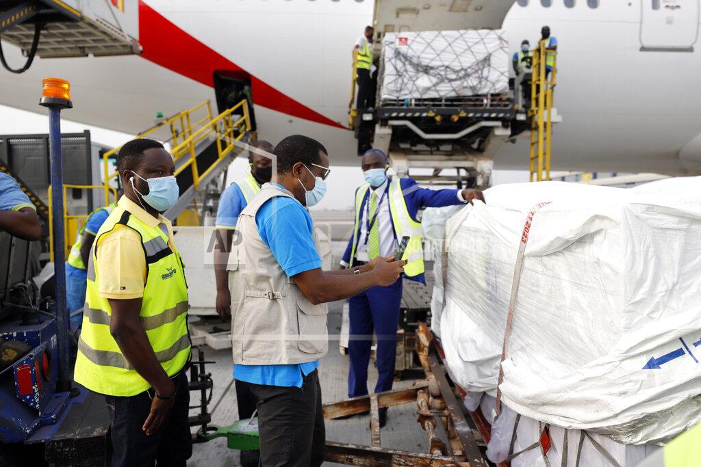 Francis Kokoroko This photograph released by UNICEF Wednesday Feb. 24, 2021, shows the first shipment of COVID-19 vaccines distributed by the COVAX Facility arriving at the Kotoka International Airport in Accra, Ghana. Ghana has become the first country in the world to receive vaccines acquired through the United Nations-backed COVAX initiative with a delivery of 600,000 doses of the AstraZeneca vaccine made by the Serum Institute of India. (Francis Kokoroko/UNICEF via AP)