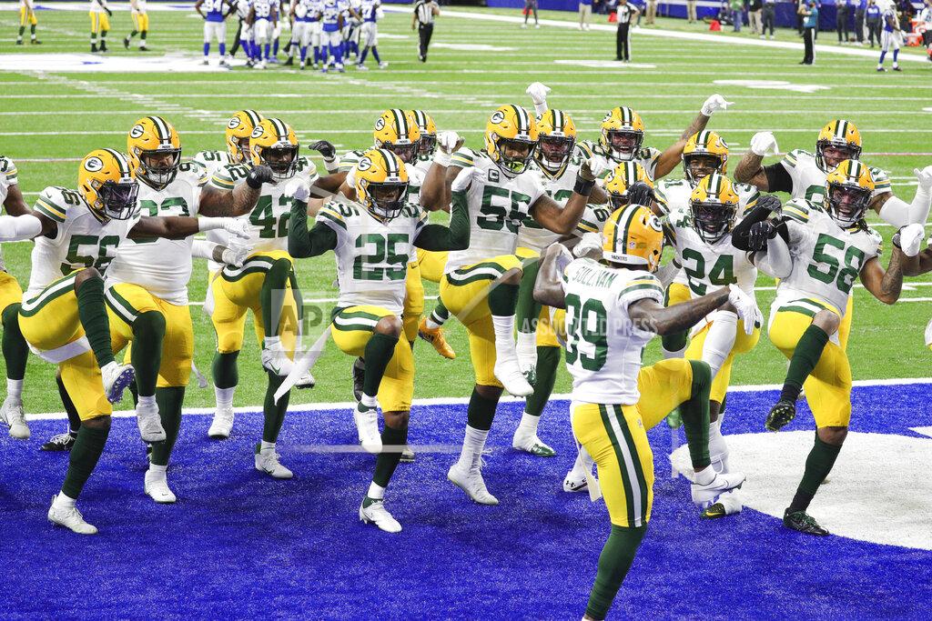 Margaret Bowles The Green Bay Packers celebrate a touchdown Sunday, Nov. 22, 2020 during an NFL game against the Indianapolis Colts in Indianapolis. The Colts defeated the Packers 34-31. (Margaret Bowles via AP)