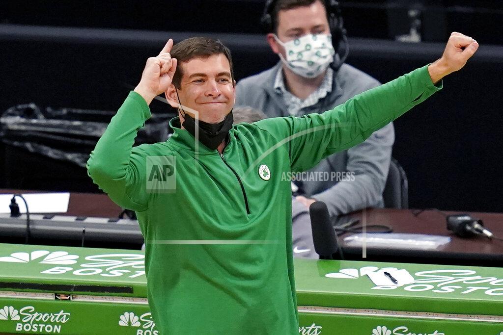 Charles Krupa Boston Celtics head coach Brad Stevens calls to his players during the first half of an NBA basketball game against the Denver Nuggets, Tuesday, Feb. 16, 2021, in Boston. (AP Photo/Charles Krupa)