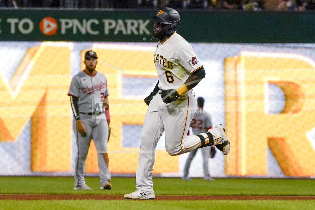 Keith Srakocic Pittsburgh Pirates' Anthony Alford (6) runs the bases in front of Washington Nationals second basemen Luis Garcia after hitting a solo home run during the seventh inning of a baseball game Friday, Sept. 10, 2021, in Pittsburgh. (AP Photo/Keith Srakocic)