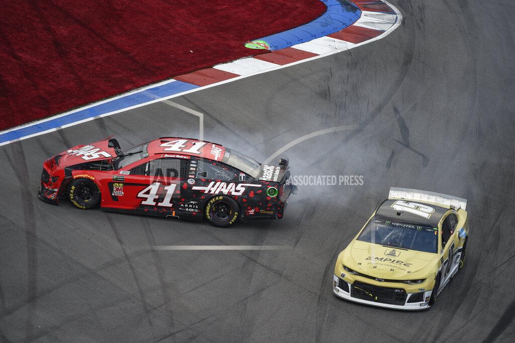 Mike Mccarn Daniel Suarez (41) spins in Turn 16 during a NASCAR Cup Series auto race at Charlotte Motor Speedway, Sunday, Sept. 29, 2019, in Concord, N.C. (AP Photo/Mike McCarn)