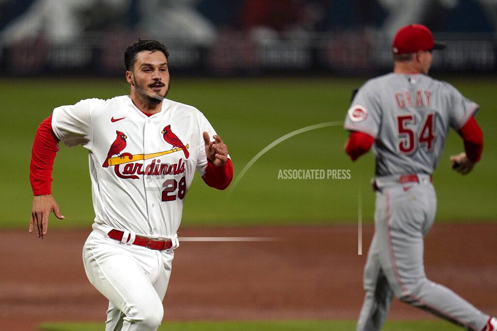 Jeff Roberson St. Louis Cardinals' Nolan Arenado (28) runs in to score past Cincinnati Reds starting pitcher Sonny Gray (54) on a double by Yadier Molina during the third inning of a baseball game Friday, April 23, 2021, in St. Louis. (AP Photo/Jeff Roberson)