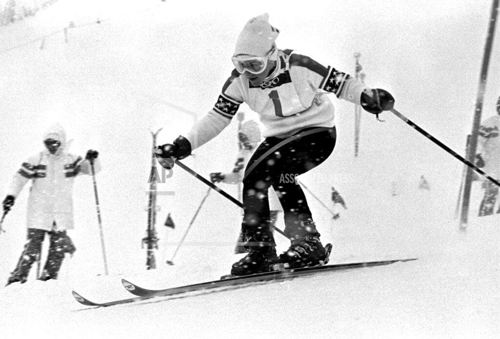 Th FILE - Barbara Ann Cochran of the United States skis to win the gold medal in the Winter Olympic women's slalom event, on Feb. 11, 1972, Sapporo, Japan. Fifty years after his mom, Barbara Ann, won the gold in slalom, Ryan Cochran-Siegle is contending for a medal in the men's downhill that will open the Alpine skiing program of the Beijing Games on Sunday. (AP Photo, File)
