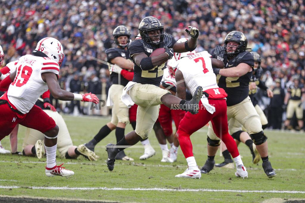 Michael Conroy Purdue running back King Doerue (22) leaps in for a touchdown against Nebraska during the second half of an NCAA college football game in West Lafayette, Ind., Saturday, Nov. 2, 2019. Purdue defeated Nebraska 31-27. (AP Photo/Michael Conroy)