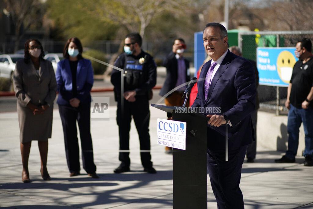 John Locher Superintendent Jesus Jara speaks during a news conference at Dean Petersen Elementary School, Wednesday, Feb. 24, 2021, in Las Vegas. School administrators in Las Vegas say they plan a phased return to classrooms in coming weeks for middle- and high school students in the nation's fifth-largest school district. (AP Photo/John Locher)
