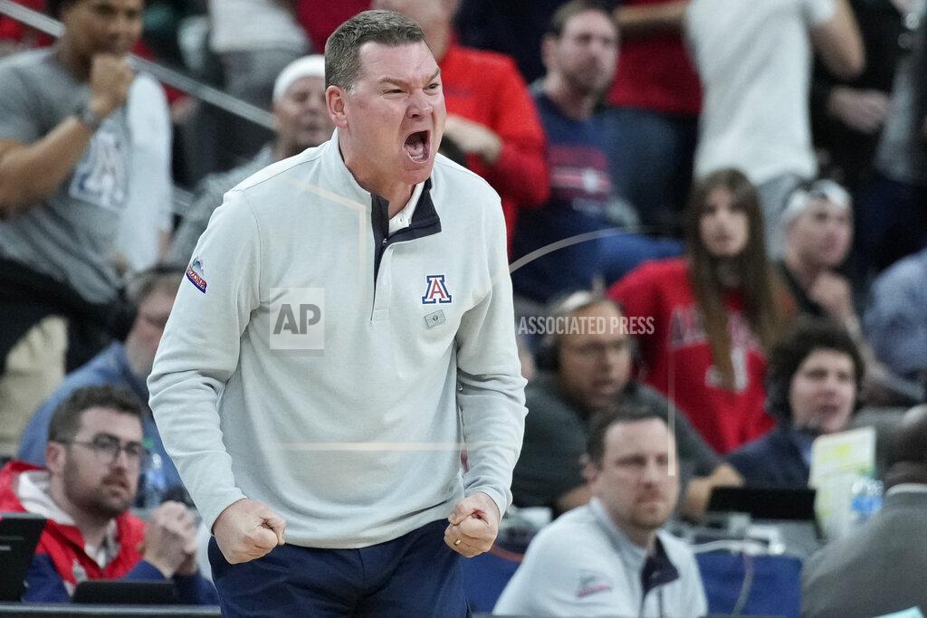 John Locher Arizona head coach Tommy Lloyd yells towards the court during the second half of an NCAA college basketball game against Colorado in the semifinal round of the Pac-12 tournament Friday, March 11, 2022, in Las Vegas. (AP Photo/John Locher)