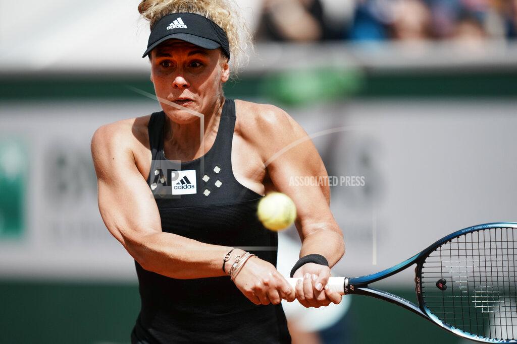 Thibault Camus France's Leolla Jeanjean plays a shot against Karolina Pliskova of the Czech Republic during their second round match at the French Open tennis tournament in Roland Garros stadium in Paris, France, Thursday, May 26, 2022. (AP Photo/Thibault Camus)