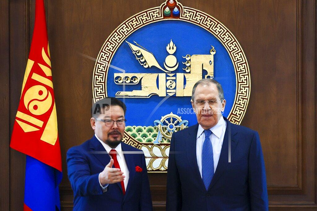 Uncredited In this photo released by Russian Foreign Ministry Press Service, Chairman of the State Great Khural, the parliament of Mongolia, Gombojavyn Zandanshatar, left, and Russian Foreign Minister Sergey Lavrov pose for a photo prior to their talks in Ulaanbaatar, Mongolia, Tuesday, July 5, 2022. (Russian Foreign Ministry Press Service via AP)
