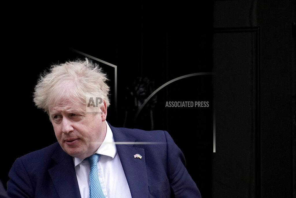 Matt Dunham FILE - British Prime Minister Boris Johnson leaves 10 Downing Street to attend the weekly Prime Minister's Questions at the Houses of Parliament, in London, Wednesday, March 9, 2022. A highly-anticipated report into the British government’s “partygate” scandal that could determine Prime Minister Boris Johnson’s political fortunes is set to be published this week, after months of delay. Senior civil servant Sue Gray, who has been tasked with investigating multiple lockdown-flouting gatherings at Johnson’s official residence and other government sites, is widely expected to release her findings within days. (AP Photo/Matt Dunham, File)