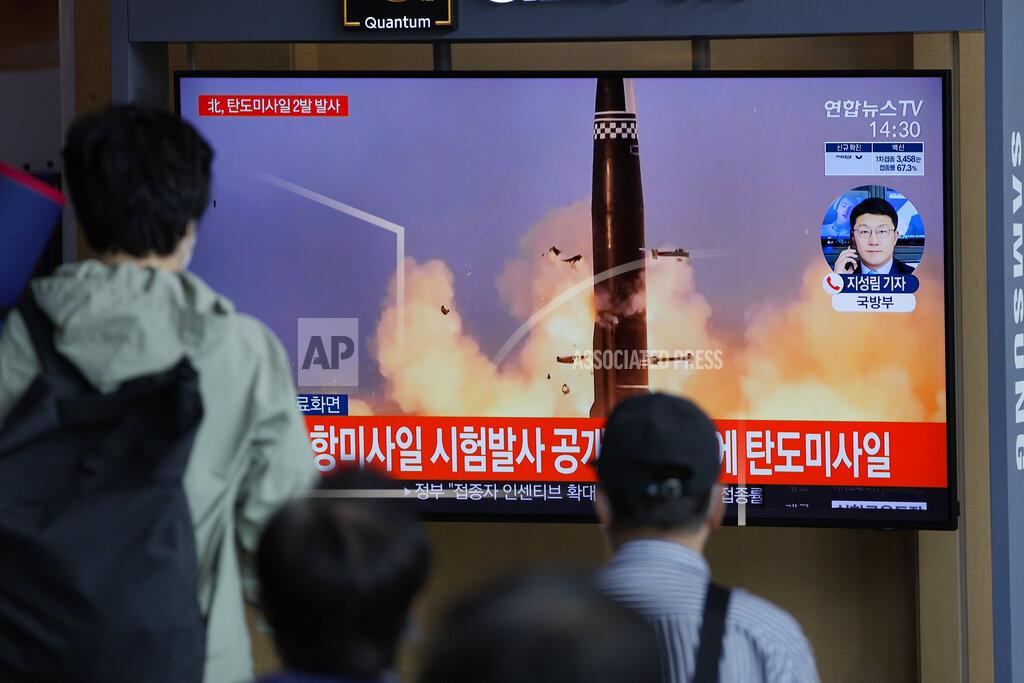 Lee Jin-Man People watch a TV screen showing a news program reporting about North Korea's missiles with file image in Seoul, South Korea, Wednesday, Sept. 15, 2021. North Korea fired two ballistic missiles into waters off its eastern coast Wednesday afternoon, two days after claiming to have tested a newly developed missile in a resumption of its weapons displays after a six-month lull. The letters read "North Korea fired two ballistic missiles." (AP Photo/Lee Jin-man)