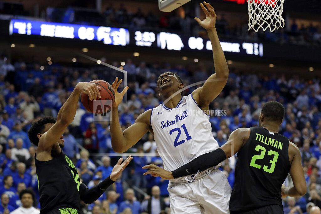 Adam Hunger Seton Hall center Ike Obiagu (21) has the ball stripped by Michigan State forward Malik Hall (25) in front of Michigan State forward Xavier Tillman (23) during the second half of an NCAA college basketball game Thursday, Nov. 14, 2019, in Newark, N.J. (AP Photo/Adam Hunger)