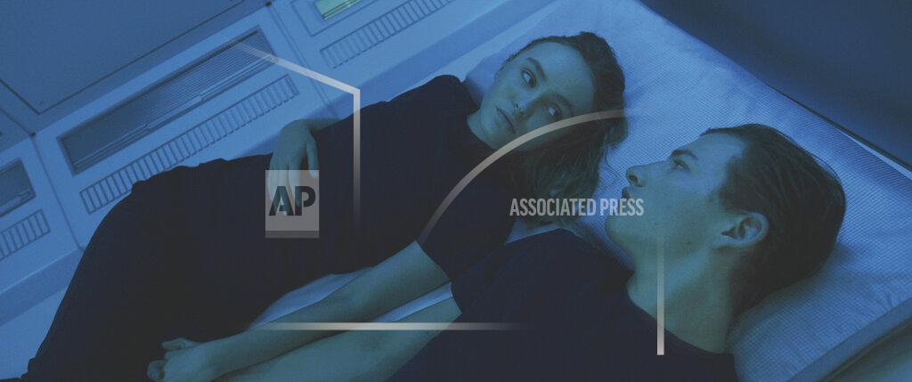 Uncredited This image released by Lionsgate shows Lily-Rose Depp, left, and Tye Sheridan in a scene from "Voyagers." (Lionsgate via AP)