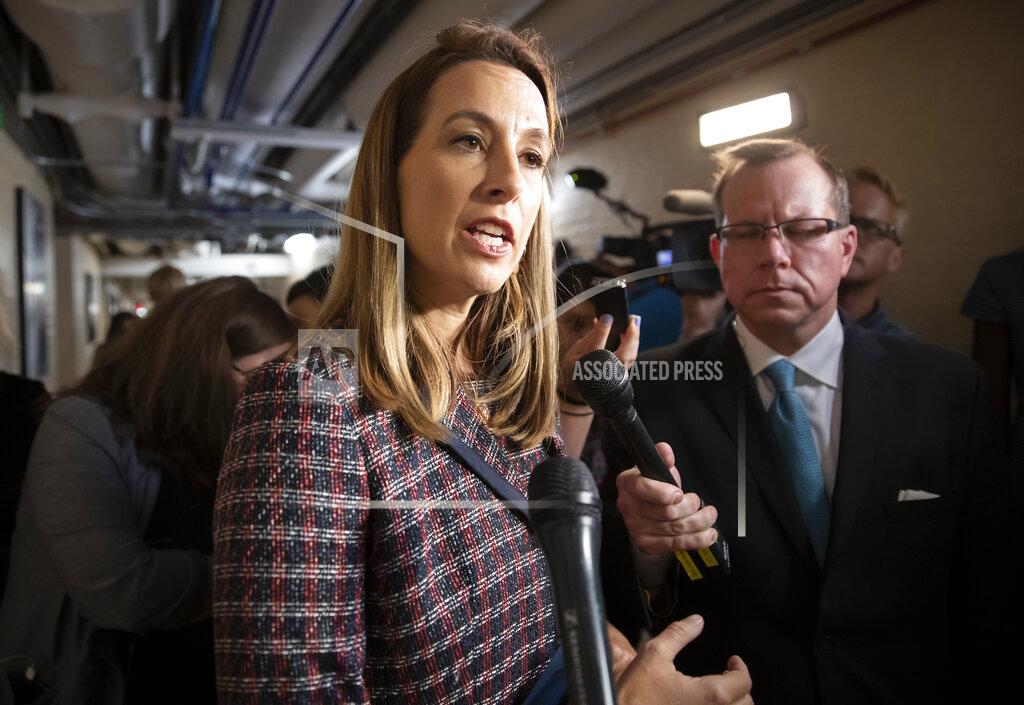 FILE - In this Sept. 24, 2019, file photo Rep. Mikie Sherrill, D-N.J., talks to reporters at the Capitol in Washington. As President Donald Trump tries to moves on from the coronavirus, Congress is rushing to fill the void and prepare the country for the long fight ahead. “This is going to be on us,” said Sherrill, D-N.J. (AP Photo/J. Scott Applewhite, File)