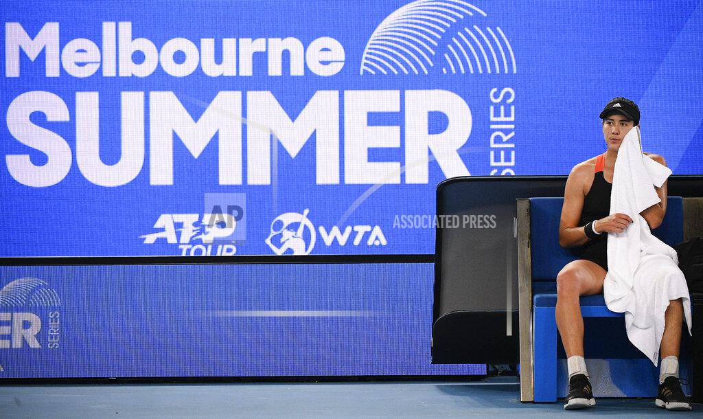 Andy Brownbill Spain's Garbine Muguruza rests during her match against Australia's Ash Barty in the final of the Yarra River Classic in Melbourne, Australia, Sunday, Feb. 7, 2021.(AP Photo/Andy Brownbill)