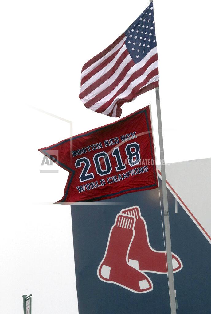 Charles Krupa The Boston Red Sox 2018 World Series Champions pennant flies over center field during the fourth inning of the home opener baseball game between the Red Sox and Toronto Blue Jays, Tuesday, April 9, 2019, in Boston. (AP Photo/Charles Krupa)