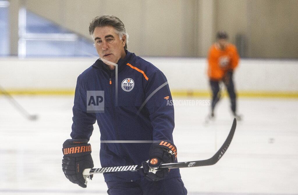Jason Franson Edmonton Oilers' head coach Dave Tippett skates during training camp in Edmonton, Alta., on Tuesday July 14, 2020. (Jason Franson/The Canadian Press via AP)