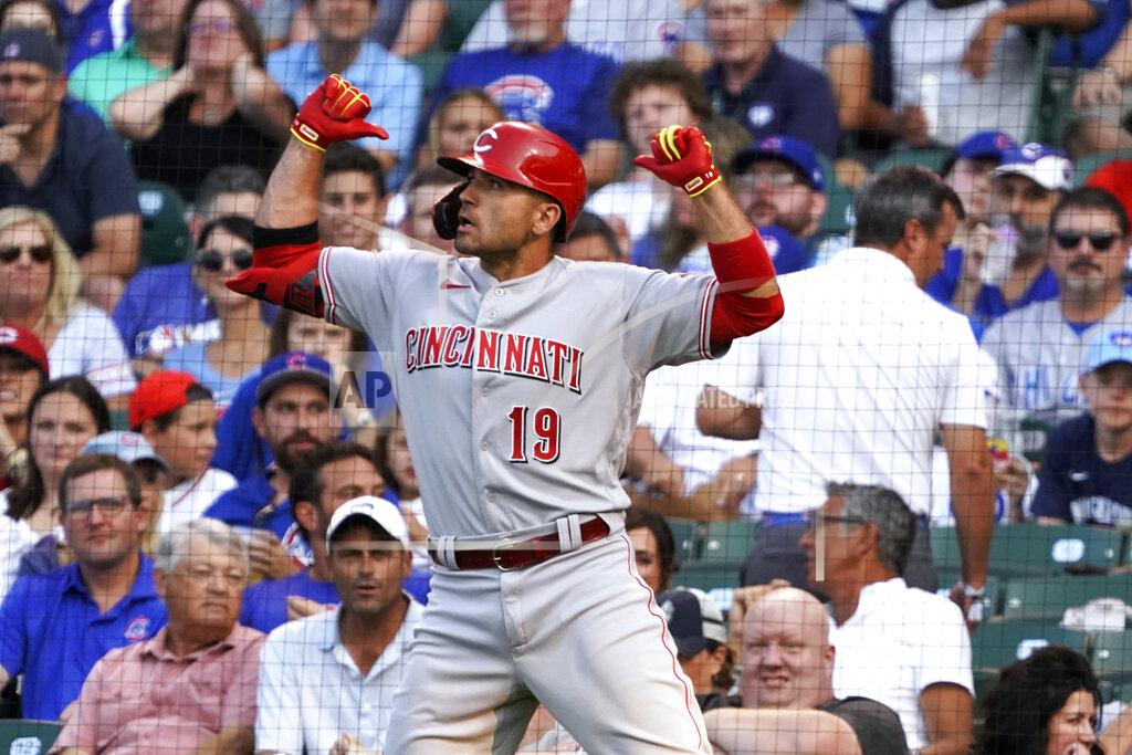 David Banks Cincinnati Reds' Joey Votto (19) gestures as he goes back to the dugout after hitting a home run against the Chicago Cubs during the first inning of a baseball game Tuesday, July 27, 2021, in Chicago. (AP Photo/David Banks)