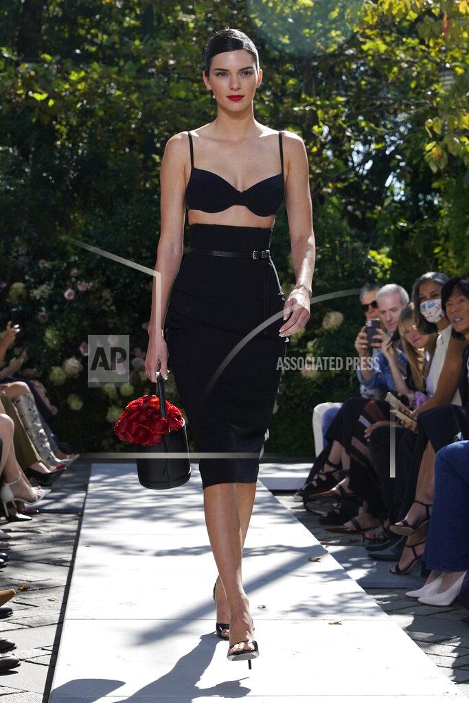Richard Drew The Michael Kors Spring/Summer 2022 collection is modeled during Fashion Week, in New York, Friday, Sept. 10, 2021. (AP Photo/Richard Drew)
