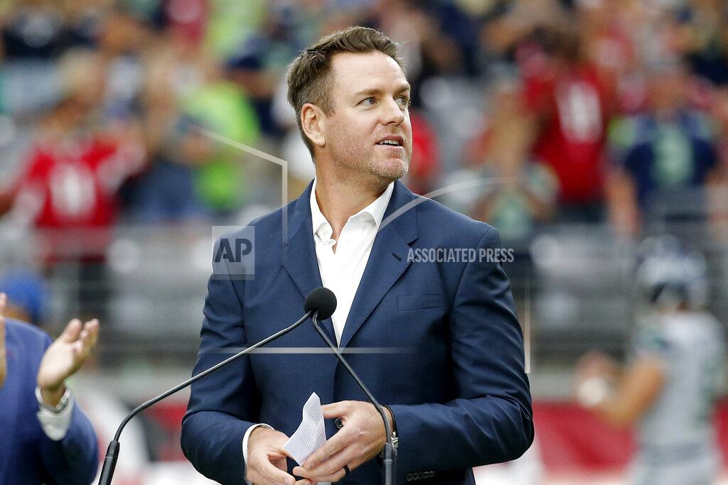 Rick Scuteri Former Arizona Cardinals quarterback Carson Palmer watches as his names is added to the Cardinals' ring of honor at half time an NFL football game against the Seattle Seahawks, Sunday, Sept. 29, 2019, in Glendale, Ariz. (AP Photo/Rick Scuteri)