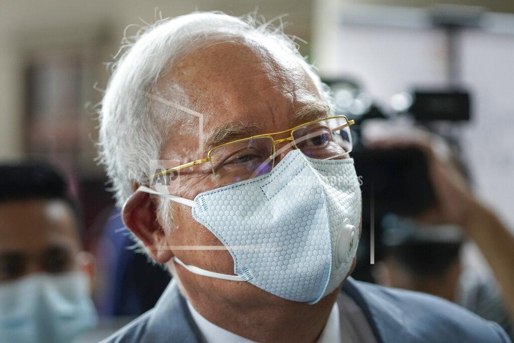 Vincent Thian Former Malaysian Prime Minister Najib Razak wearing a face mask arrives at court house in Kuala Lumpur, Malaysia, Thursday, June 4, 2020. Closing arguments are expected in the first corruption trial of him linked to the multibillion-dollar looting of the 1MDB state investment fund. (AP Photo/Vincent Thian)