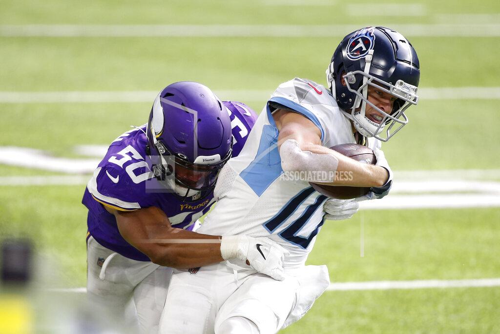 Bruce Kluckhohn Tennessee Titans wide receiver Adam Humphries is tackled by Minnesota Vikings linebacker Eric Wilson (50) after catching a pass during the second half of an NFL football game, Sunday, Sept. 27, 2020, in Minneapolis. (AP Photo/Bruce Kluckhohn)