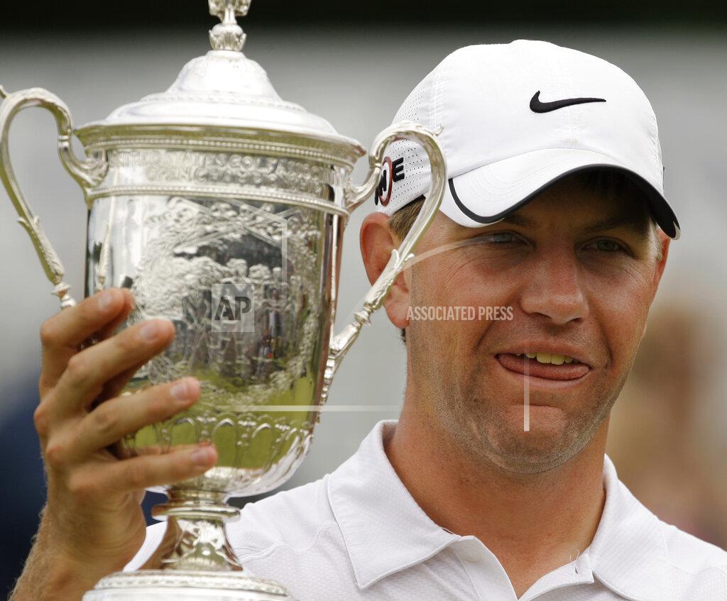 Charles Krupa FILE - In this June 22, 2009, file photo, Lucas Glover holds his trophy after winning the U.S. Open Golf Championship at Bethpage State Park's Black Course in Farmingdale, N.Y. Glover is the last qualifier to win the U.S. Open. The USGA announced exemption categories Thursday, June 25, 2020, because the COVID-19 pandemic eliminated any chance of holding qualifiers across the country. (AP Photo/Charles Krupa, File)