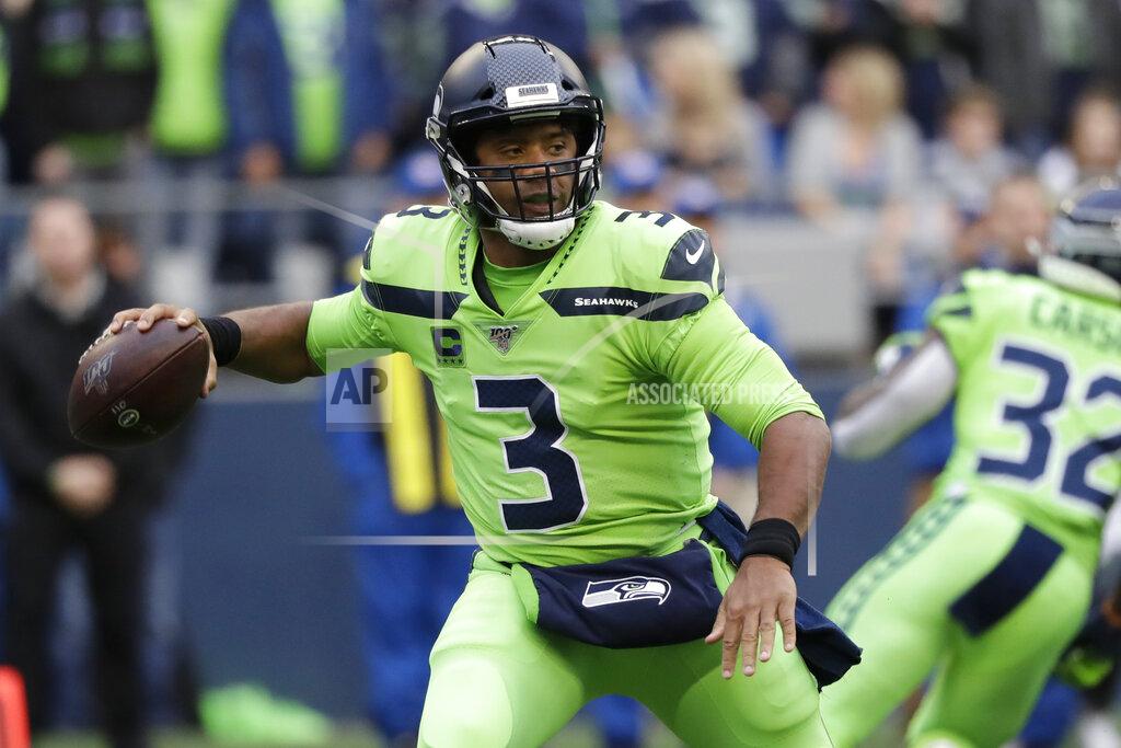 Elaine Thompson Seattle Seahawks quarterback Russell Wilson drops back to pass against the Los Angeles Rams during the first half of an NFL football game Thursday, Oct. 3, 2019, in Seattle. (AP Photo/Elaine Thompson)