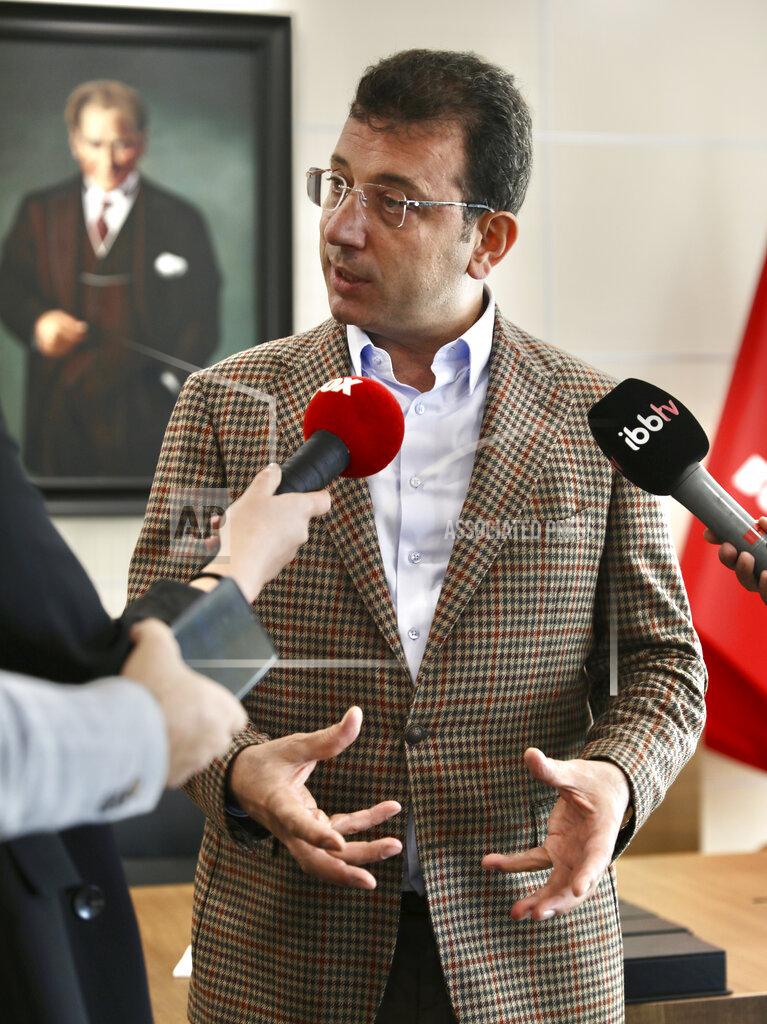 Uncredited In this photo provided by Istanbul's Mayor's Office, Ekrem Imamoglu, the mayor of Istanbul, speaks to the media, in Istanbul, Friday, Oct. 23, 2020. A city government spokesman says the mayor of Istanbul has tested positive for COVID-19 and received treatment at a hospital. The city spokesman tweeted Saturday, Oct. 24, 2020 that Mayor Ekrem Imamoglu's condition is good. Imamoglu represents the opposition Republican People’s Party and became one of Turkey’s most recognizable politicians after winning office in June 2019. (Istanbul Mayor's Office via AP)