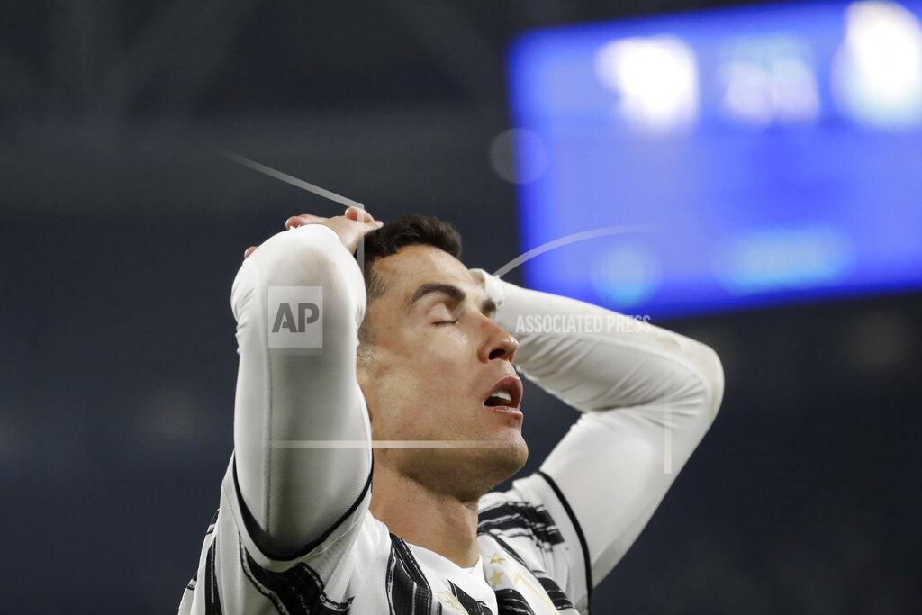 Luca Bruno Juventus' Cristiano Ronaldo reacts after failing to score during the Champions League, round of 16, second leg, soccer match between Juventus and Porto in Turin, Italy, Tuesday, March 9, 2021. (AP Photo/Luca Bruno)