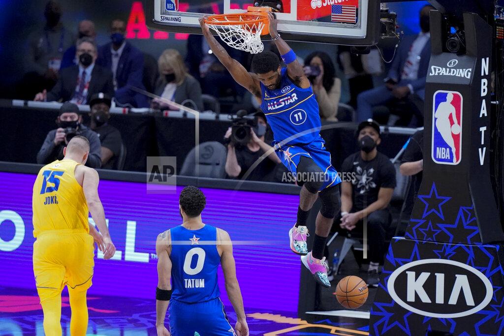 Brynn Anderson Brooklyn Nets guard Kyrie Irving dunks during the second half of basketball's NBA All-Star Game in Atlanta, Sunday, March 7, 2021. (AP Photo/Brynn Anderson)