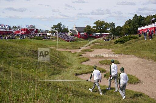 Team Europe's Bernd Wiesberger, Team Europe's Tommy Fleetwood and Team Europe's Viktor Hovland walk up the ninth hole during a practice day at the Ryder Cup at the Whistling Straits Golf Course Wednesday, Sept. 22, 2021, in Sheboygan, Wis. (AP Photo/Jeff Roberson)
