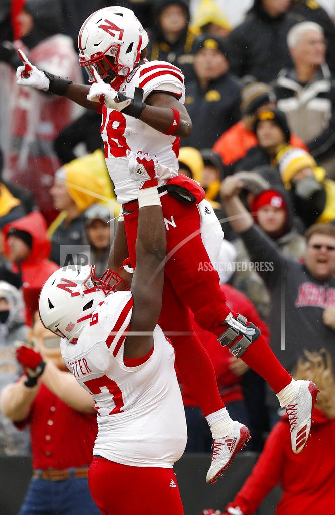 Charlie Neibergall Nebraska running back Maurice Washington celebrates with teammate Jerald Foster, left, after catching a 28-yard touchdown pass during the second half of an NCAA college football game against Iowa, Friday, Nov. 23, 2018, in Iowa City, Iowa. Iowa won 31-28. (AP Photo/Charlie Neibergall)