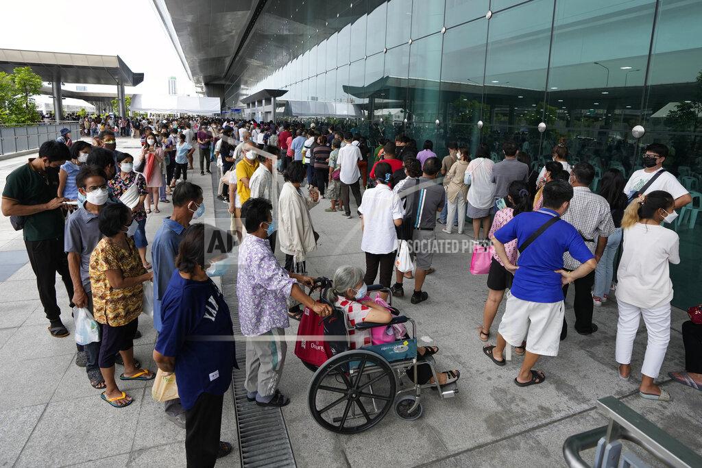 Sakchai Lalit Residents wait on line to receive shots of the AstraZeneca COVID-19 vaccine at the Central Vaccination Center in Bangkok, Thailand, Thursday, July 22, 2021. (AP Photo/Sakchai Lalit)