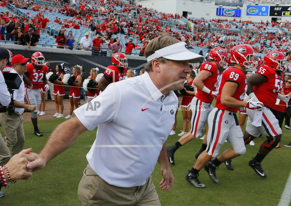 Bob Andres Georgia coach Kirby Smart takes the field with his team for pregame warm ups prior to an NCAA college football game against Florida, Saturday, Oct. 27, 2018 in Jacksonville, Fla. (Bob Andres/Atlanta Journal-Constitution via AP)