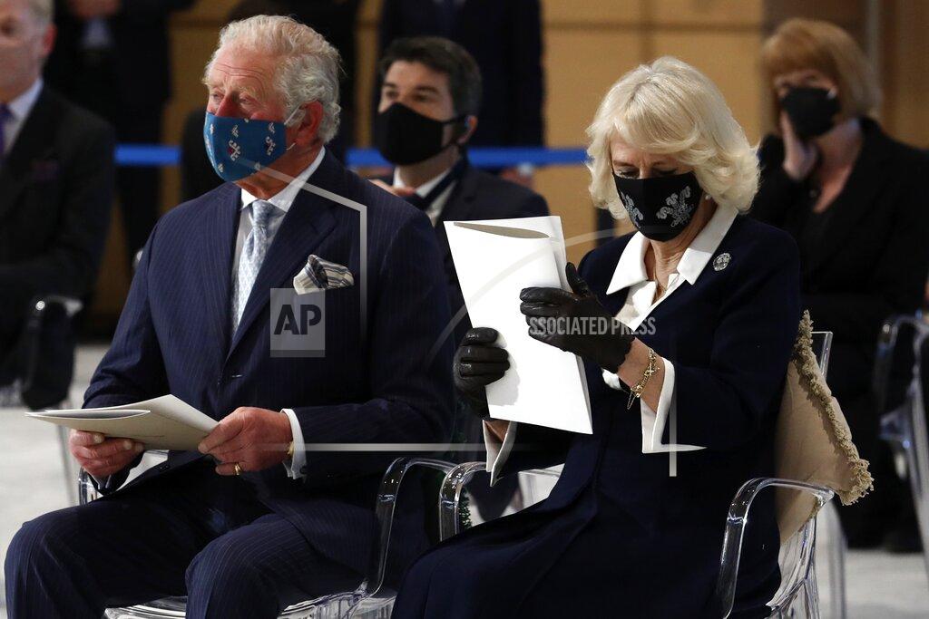 Yorgos Karahalis Britain's Prince Charles, left, and his wife Camilla, the Duchess of Cornwall, attend a ceremony at Greece's newly renovated National Gallery in Athens, Wednesday, March 24, 2021. Greece on Wednesday kicked off two days of celebrations to mark the bicentenary of the start of the country's war of independence, although events are far more muted than originally planned due to the pandemic. (AP Photo/Yorgos Karahalis)