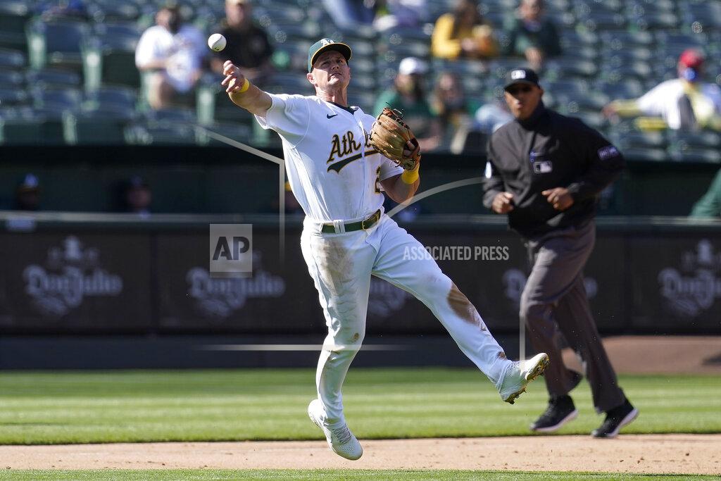Jeff Chiu Oakland Athletics third baseman Matt Chapman throws out Minnesota Twins' Jorge Polanco during the fourth inning of the first baseball game of a doubleheader in Oakland, Calif., Tuesday, April 20, 2021. (AP Photo/Jeff Chiu)