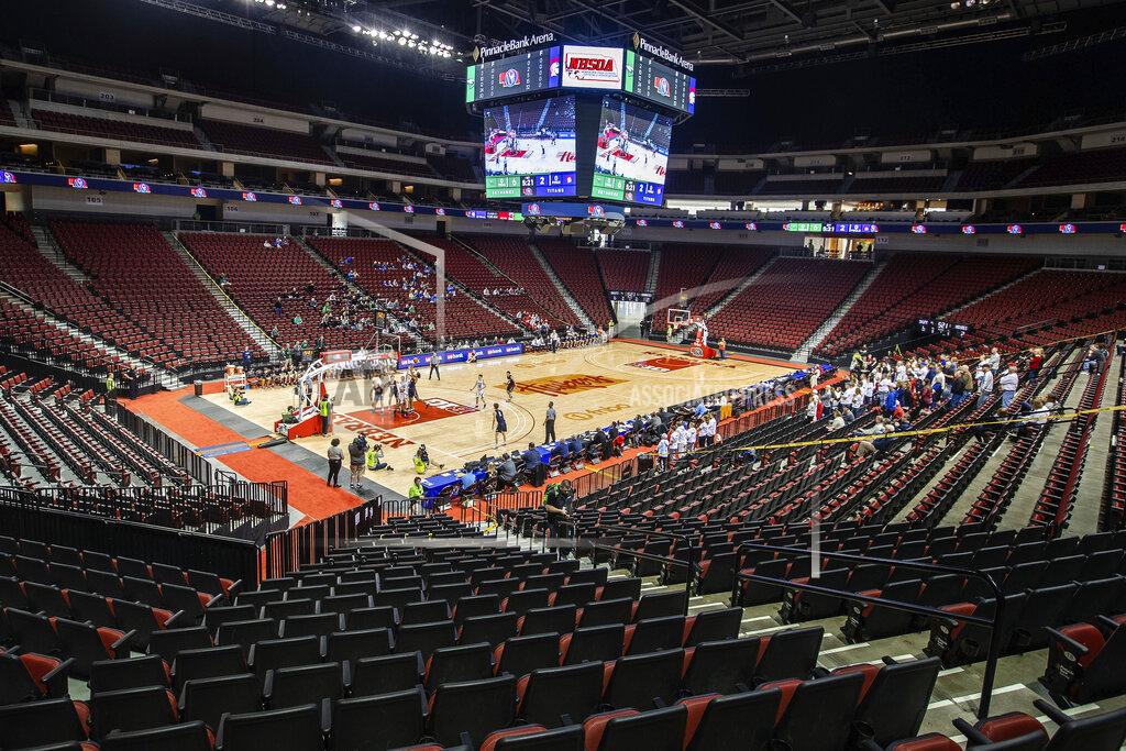 Chris Machian Omaha Skutt takes on Norris during the first day of the Nebraska boys state high school basketball tournament at Pinnacle Bank Arena Thursday, March 12, 2020, in Lincoln, Neb. The fans were restricted to staff and immediate family members due to concerns over the coronavirus. (Chris Machian/Omaha World-Herald via AP)