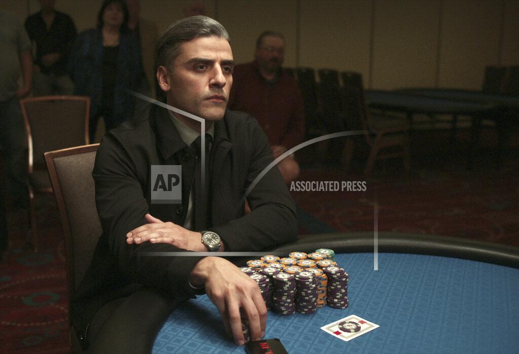 Uncredited This image released by Focus Features shows Oscar Isaac in a scene from "The Card Counter." The film will premiere at the 78th Venice International Film Festival. (Focus Features via AP)