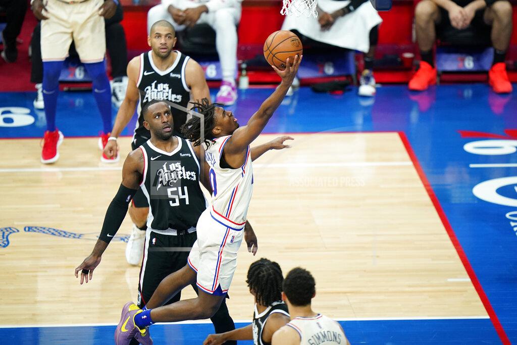 Matt Slocum Philadelphia 76ers' Tyrese Maxey, right, goes up for a shot against Los Angeles Clippers' Patrick Patterson during the second half of an NBA basketball game, Friday, April 16, 2021, in Philadelphia. (AP Photo/Matt Slocum)