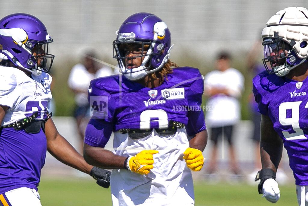 Andy Clayton-King FILE - Minnesota Vikings safety Lewis Cine (6) runs drills during NFL football training camp in Eagan, Minn., Thursday, Aug. 11, 2022. First-round draft pick Lewis Cine is expected to anchor Minnesota's secondary for many years to come, but rookies have to earn their way into the lineup. (AP Photo/Andy Clayton-King, File)