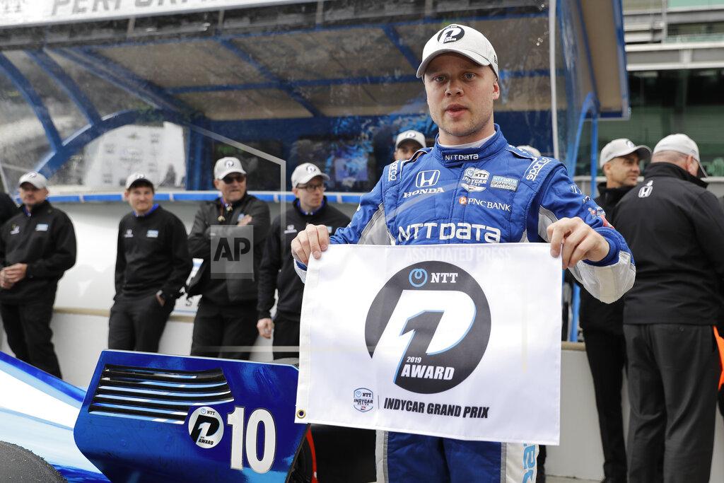 Darron Cummings Felix Rosenqvist, of Sweden, celebrates after winning the pole for the Indy GP IndyCar auto race at Indianapolis Motor Speedway, Friday, May 10, 2019 in Indianapolis. (AP Photo/Darron Cummings)