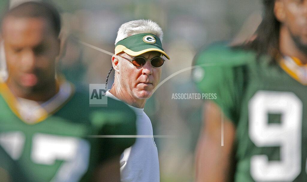 Morry Gash FILE - In this July 31, 2005, file photo, Green Bay Packers general manager Ted Thompson watches during NFL football training camp in Green Bay, Wis. Thompson, whose 13-year run as Green Bay Packers general manager included their 2010 Super Bowl championship season, died Wednesday, Jan 20, the team announced Thursday, Jan. 21, 2021. He was 68. Thompson was Packers general manager from 2005-17 and drafted many notable players on the current roster, including two-time MVP quarterback Aaron Rodgers. (AP Photo/Morry Gash, File)