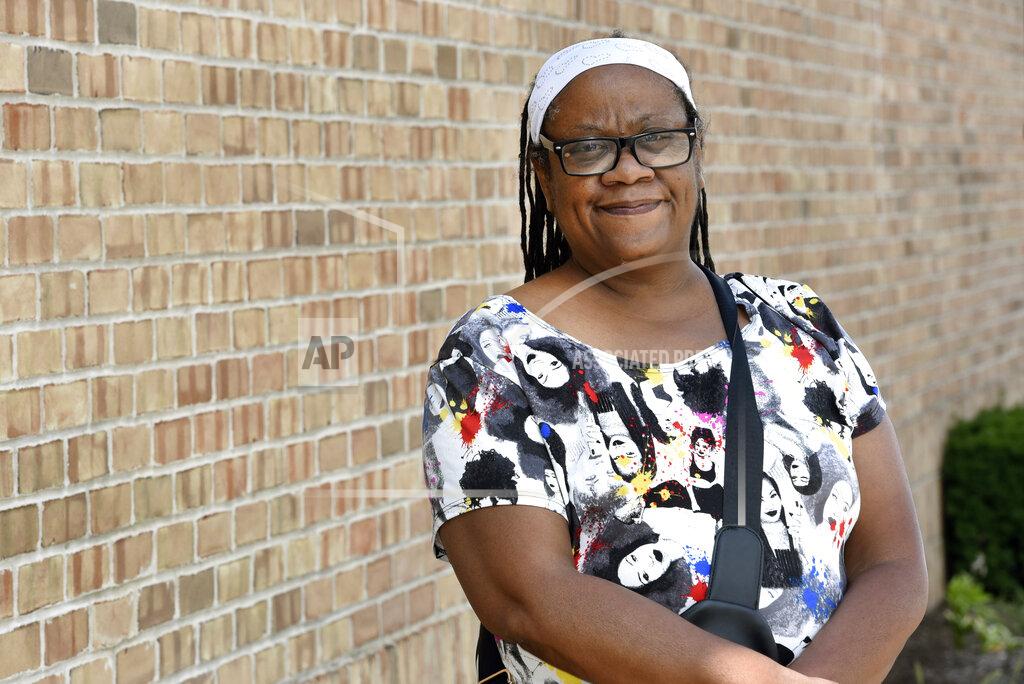 Jose Juarez Regina Howard poses for a photo in Southfield, Mich., Friday, July 30, 2021. Lakeshore Legal Aid successfully helped Howard receive $24,550 in federal funds to pay for 15 months of rent. (AP Photo/Jose Juarez)