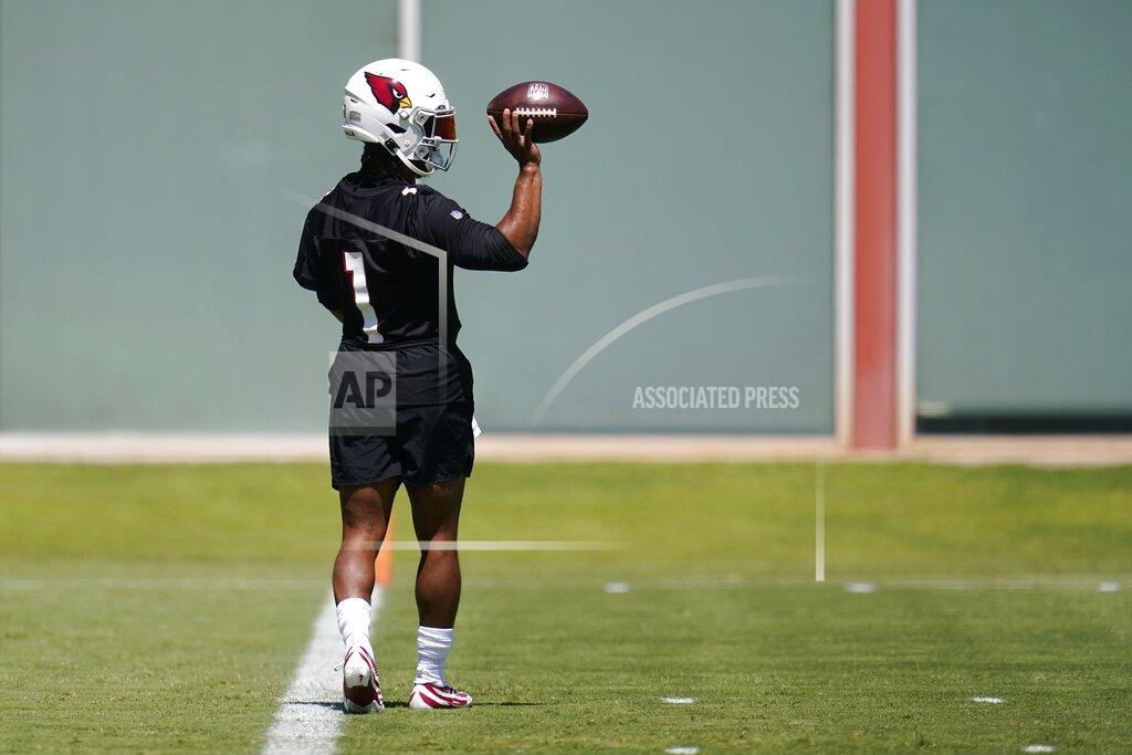 Ross D. Franklin Arizona Cardinals quarterback Kyler Murray flips the ball in the air as he takes part in drills at the NFL football team's practice facility on Tuesday, June 14, 2022, in Tempe, Ariz. (AP Photo/Ross D. Franklin)