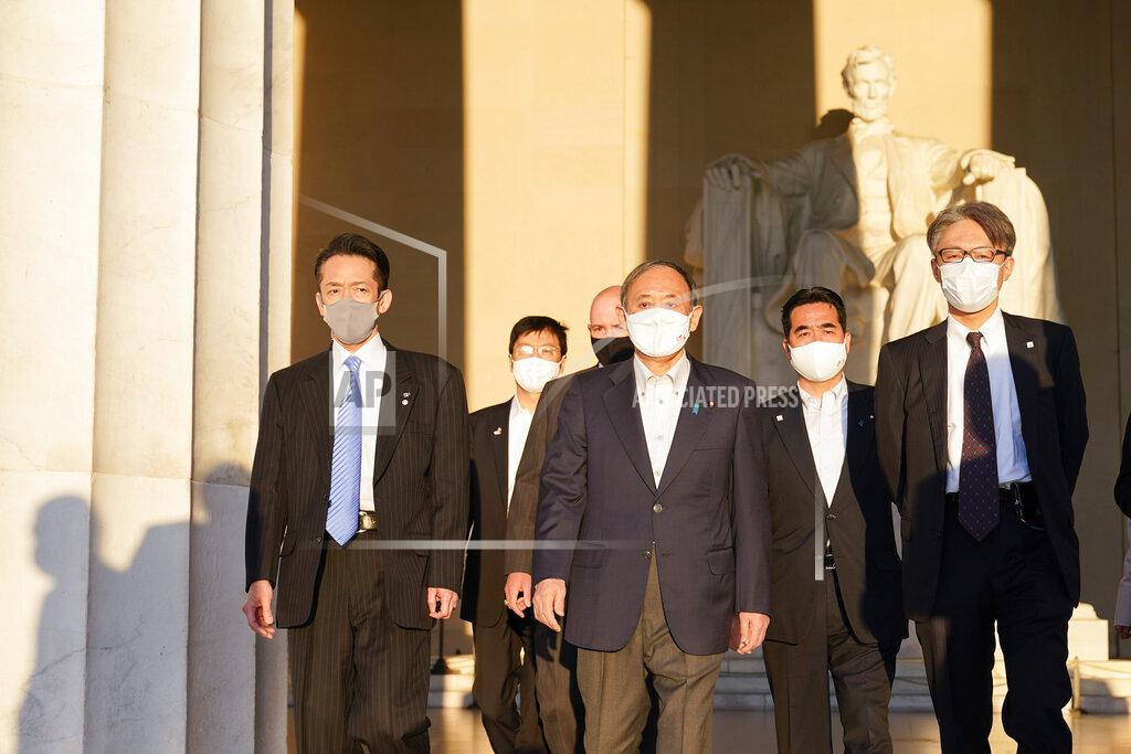 Alex Brandon Japanese Prime Minister Yoshihide Suga visits the Lincoln Memorial, Saturday, April 17, 2021, in Washington. (AP Photo/Alex Brandon)