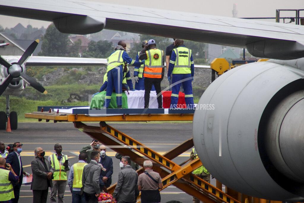 Justin Kabumba The coffins of Italian ambassador to Congo Luca Attanasio and Carabinieri officer Vittorio Iacovacci, draped with the Italian flag, are loaded onto an airplane for repatriation to Italy, at the airport in Goma, North Kivu province, Congo Tuesday, Feb. 23, 2021. An Italian Carabinieri unit is expected in Congo Tuesday to investigate the killings of the Italian ambassador to Congo, an Italian Carabinieri police officer and their driver in the country's east. (AP Photo/Justin Kabumba)